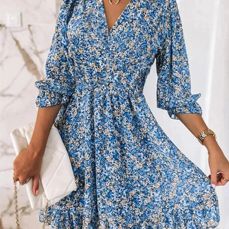 "Blue floral V-neck short dress for women by Alaiia, made with breathable fabric. Perfect for summer outings and casual…
