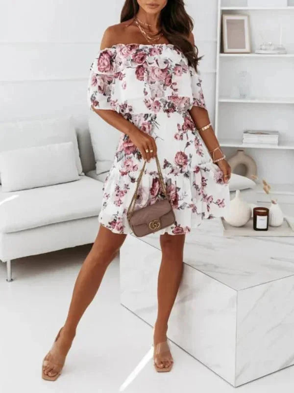 Floral dress with tiered skirt in Pink, perfect for spring. Features a soft cotton blend fabric and feminine design.