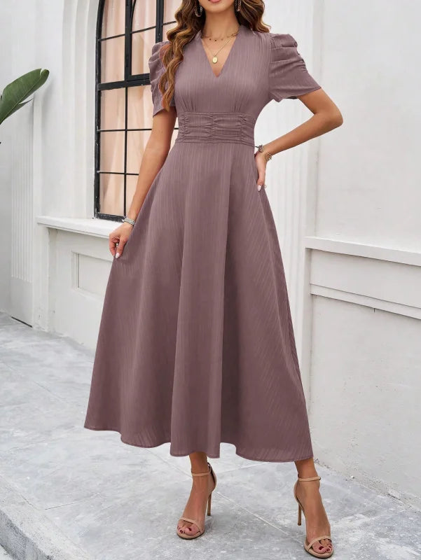 Brown ruched waist V-neck midi dress made from soft and stretchy fabric, featuring a classic and figure-flattering design.