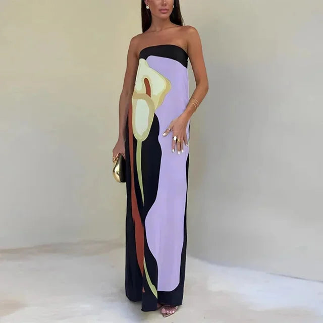 Aliyanna strapless abstract print maxi dress in Lila, made of flowy fabric with a unique abstract design, perfect for a…