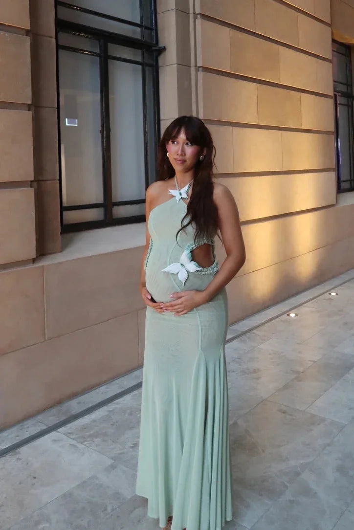 Alyson Women's mint maxi dress with halter neck, mermaid fit, ideal for summer events.