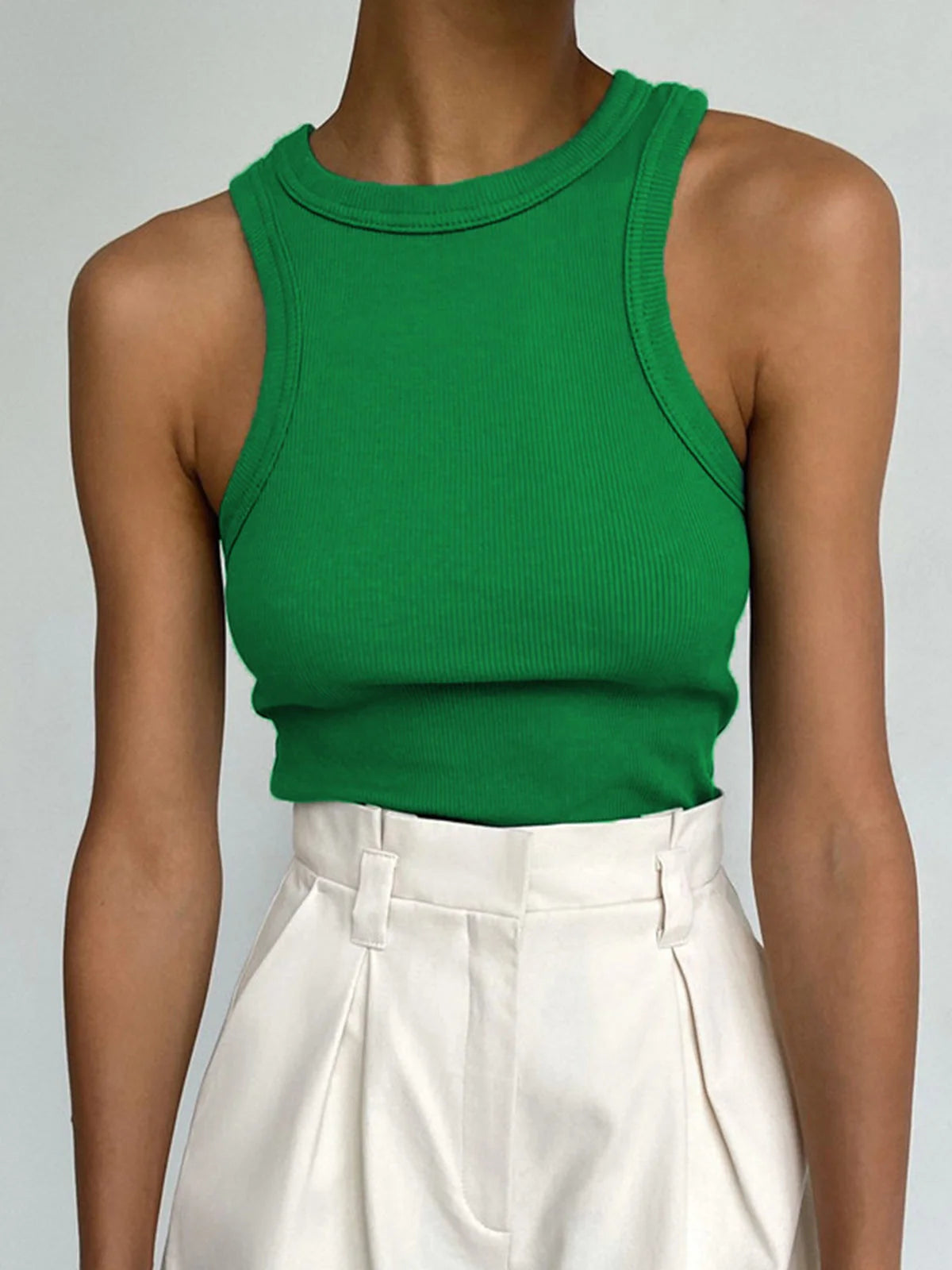 Lightweight and breathable sleeveless top by Amayrani in vibrant Green color for effortless everyday style.