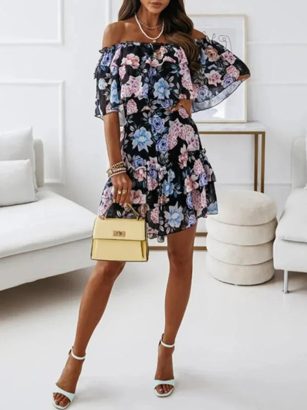 Black floral off-shoulder ruffled dress made of lightweight cotton with a breezy silhouette for a chic and feminine look.