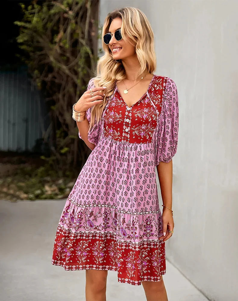 "Analayah bohemian patchwork midi dress with colorful prints and flowing silhouette for a free-spirited look."