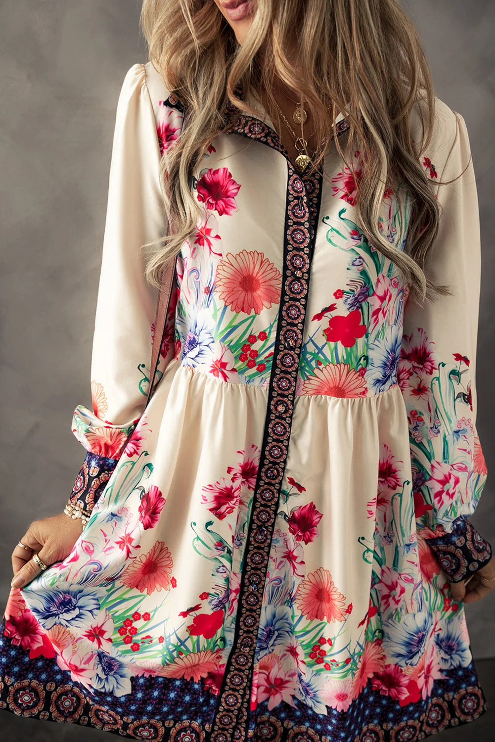 Floral mini dress in a charming design with intricate trim detailing, perfect for a casual yet stylish look.