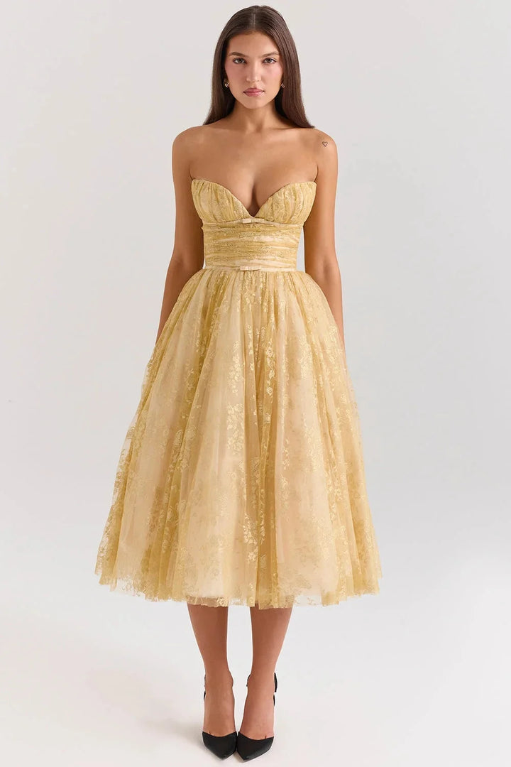 Strapless golden floral dress for women with intricate floral pattern and a playful silhouette.