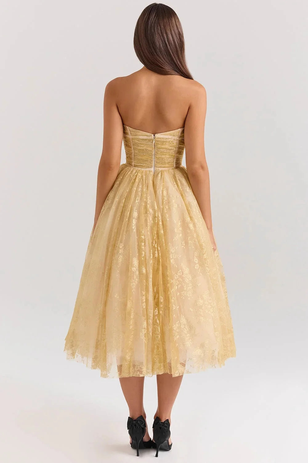 Strapless golden floral dress for women featuring delicate floral print on lightweight fabric, perfect for a summer day out.