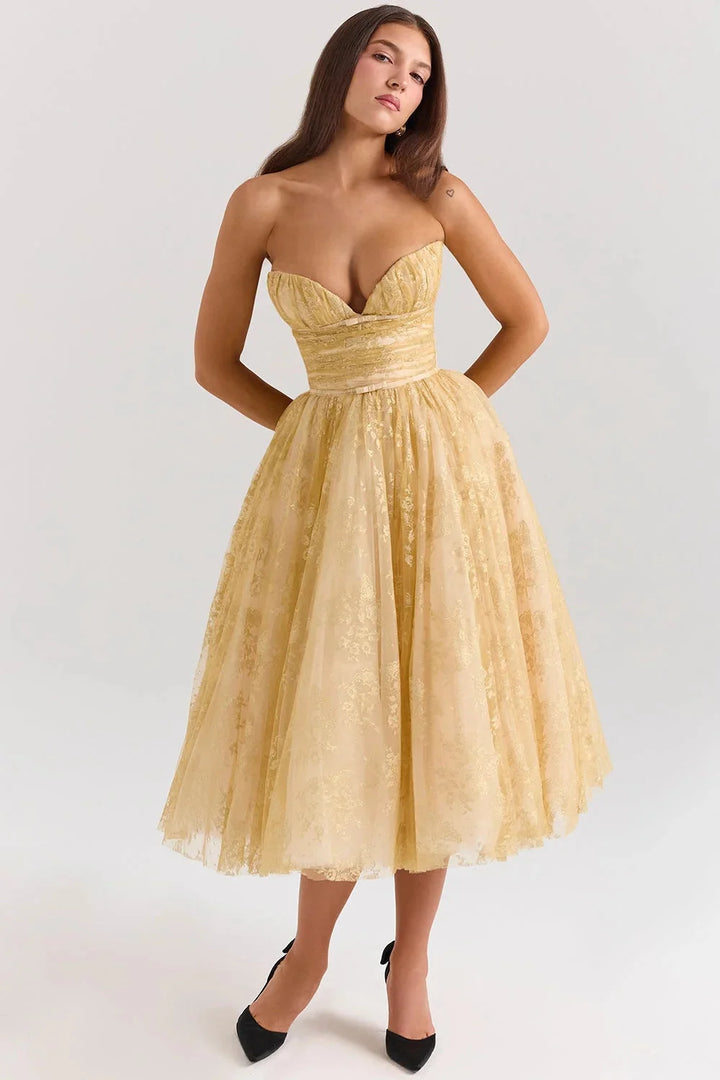 Strapless golden floral dress in Yellow for women, featuring a delicate floral pattern on a sleek and elegant design.