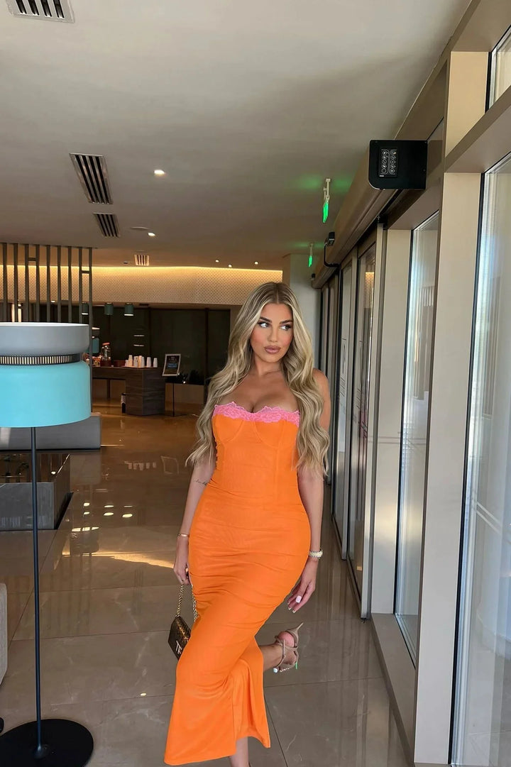Women's fitted midi dress featuring a delicate lace top for a stylish and elegant look.