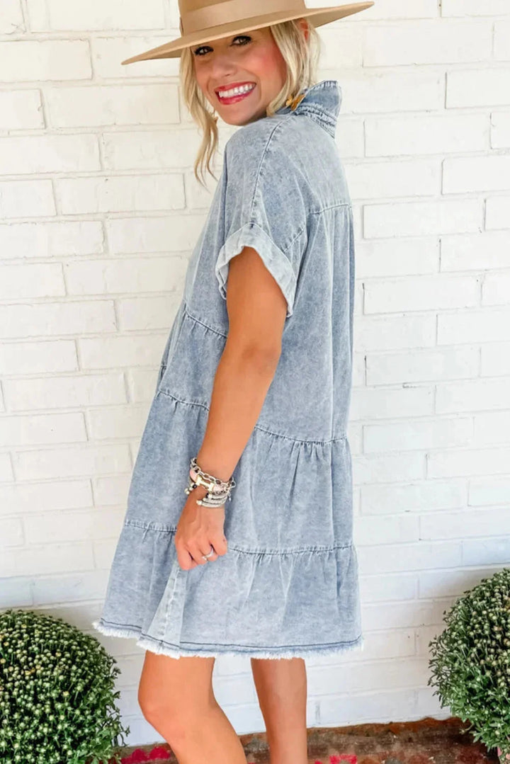 "Denim tiered dress with charming ruffled hem, perfect for casual days. A classic wardrobe piece with a touch of femininity."