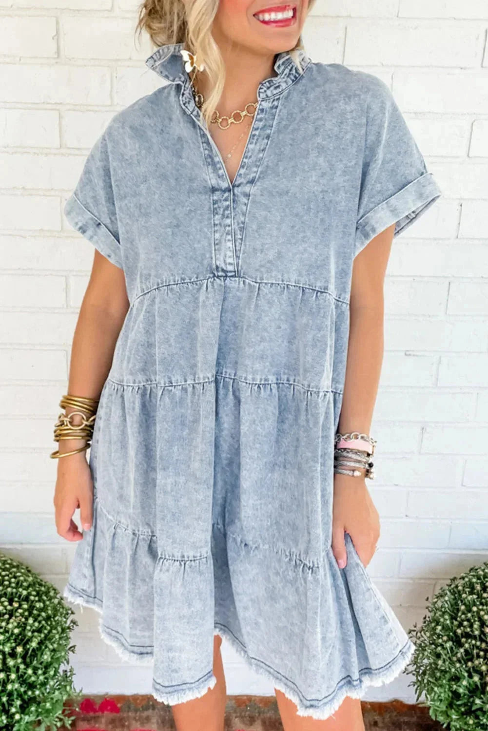 Denim dress in Beau blue with tiers and ruffled hem, perfect for a casual yet stylish look.