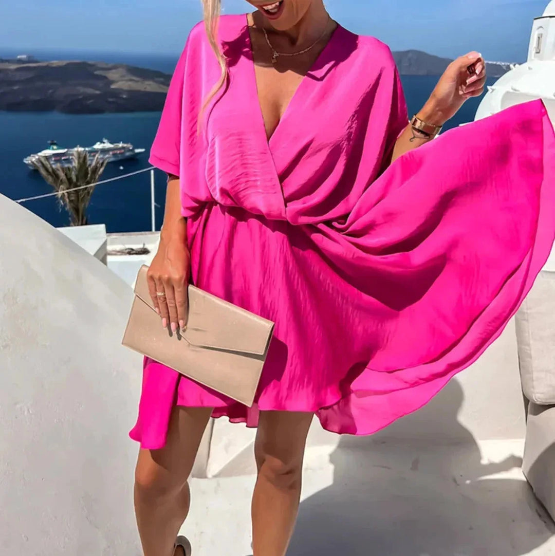 "Women's flowy dress with adjustable straps in breathable cotton-blend fabric ideal for summer wear."