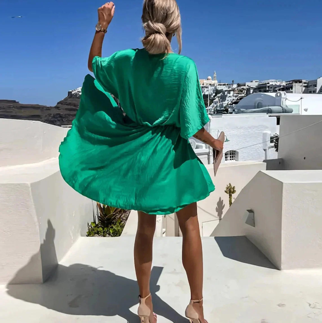 Aven Women's flowy dress in a lightweight, breathable fabric, with a relaxed fit and stylish summer design.