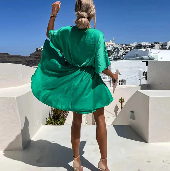 Aven Women's flowy dress in a lightweight, breathable fabric, with a relaxed fit and stylish summer design.