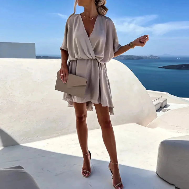"Gray flowy summer dress for women with relaxed fit, ideal for warm days. Soft and breathable fabric with stylish design."