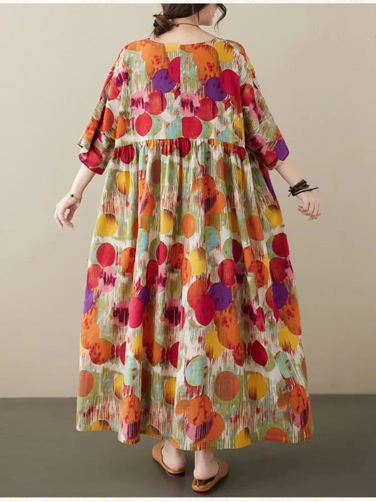 Boho maxi dress with colorful prints, featuring a relaxed fit and lightweight fabric ideal for summer outings.