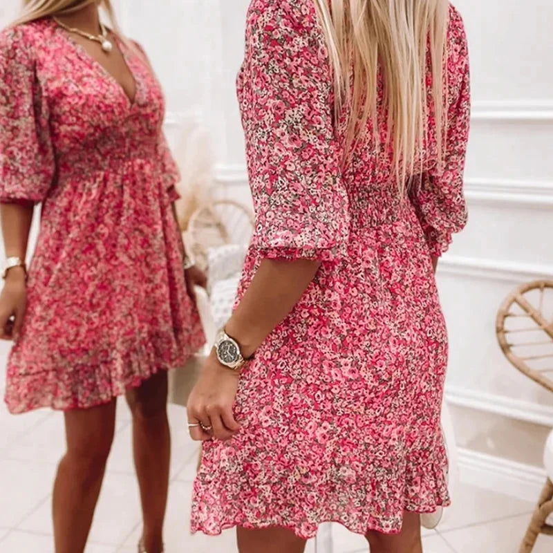 Blue V-neck floral Boho dress made of breezy fabric with a floral print, perfect for a laid-back, stylish summer look.