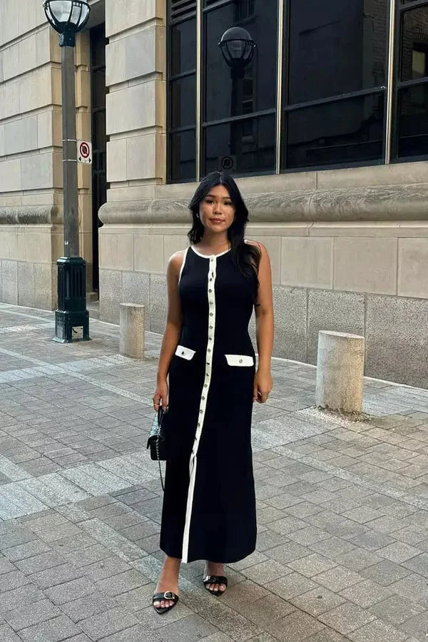 "Black sleeveless maxi dress by Celine featuring a sleek design and high-quality fabric."