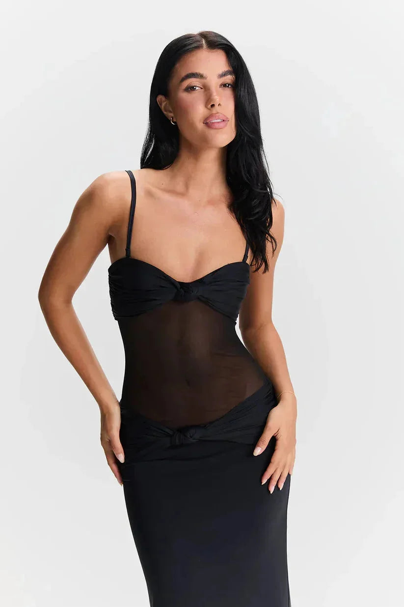Women's strapless maxi dress in black with sheer detail, perfect for a chic evening look.
