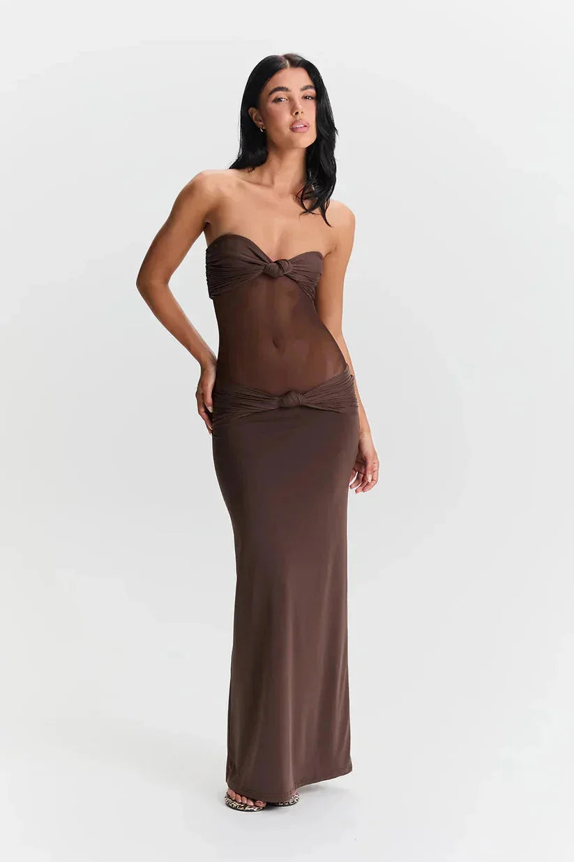 "Strapless maxi dress for women with sheer detail, perfect for a stylish look. Made with high-quality fabric. "