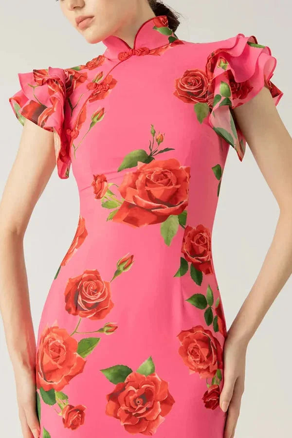 "Christiana pink maxi dress with floral print, high neckline, and ruffled sleeves in a soft and comfortable fabric."
