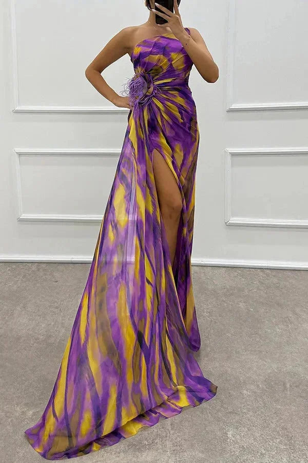 Purple maxi dress for women by Cielle with front slit and floral accent. Soft and flowy fabric, perfect for casual or formal…