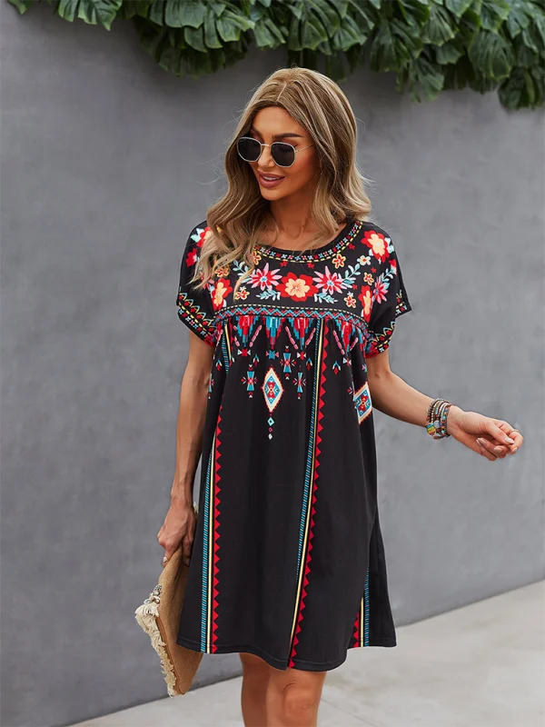 Bohemian dress with floral embroidery in earthy tones, flowing silhouette, perfect for a boho-chic style.