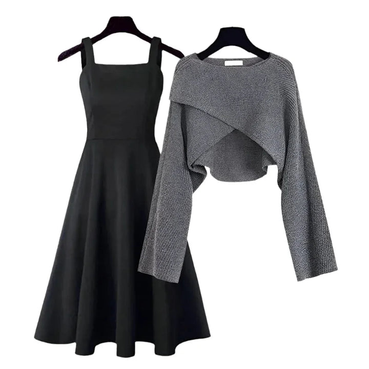 Grey two-piece outfit featuring a flared dress and fitted sweater. Made of soft knit fabric with a cozy and stylish design.