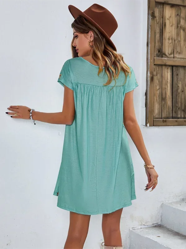 "Relaxed fit boho dress with intricate embroidery detailing and soft fabric, perfect for a laid-back bohemian look."