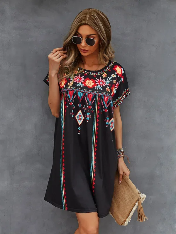 "Blue boho dress with intricate embroidery detailing and loose fit, perfect for casual bohemian style"