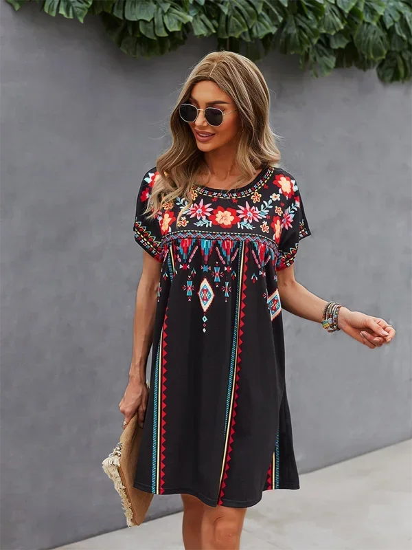 Embroidered boho dress with relaxed fit, featuring intricate floral details, perfect for a casual and stylish look in soft…
