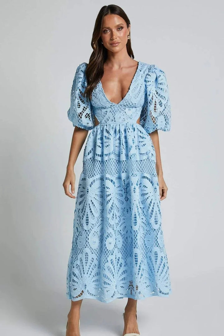 Black lace midi dress with flutter sleeves for women, elegant and feminine design.
