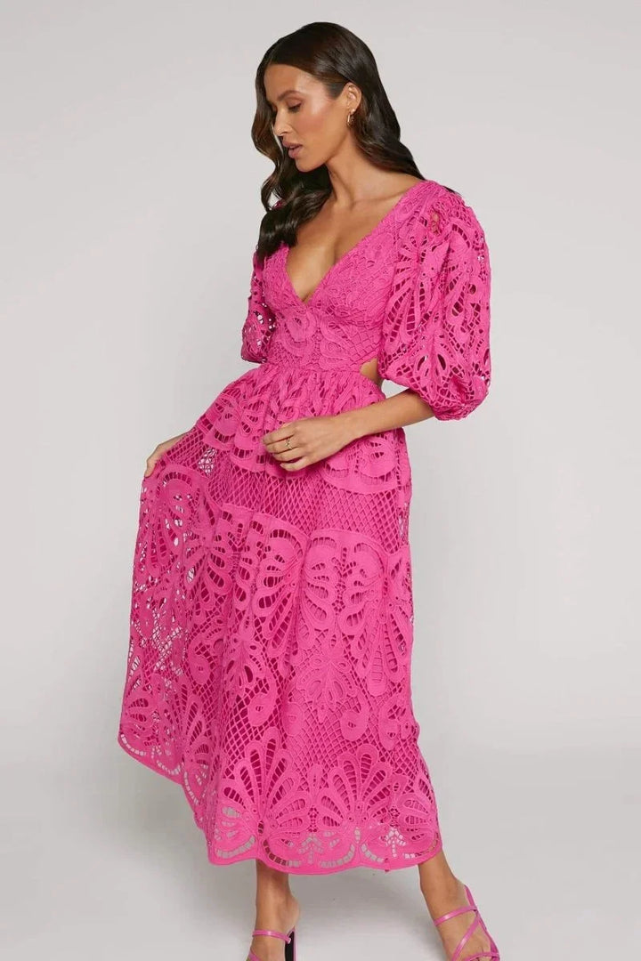Women’s lace midi dress with flutter sleeves in a beautiful floral lace pattern, perfect for special occasions or elegant…