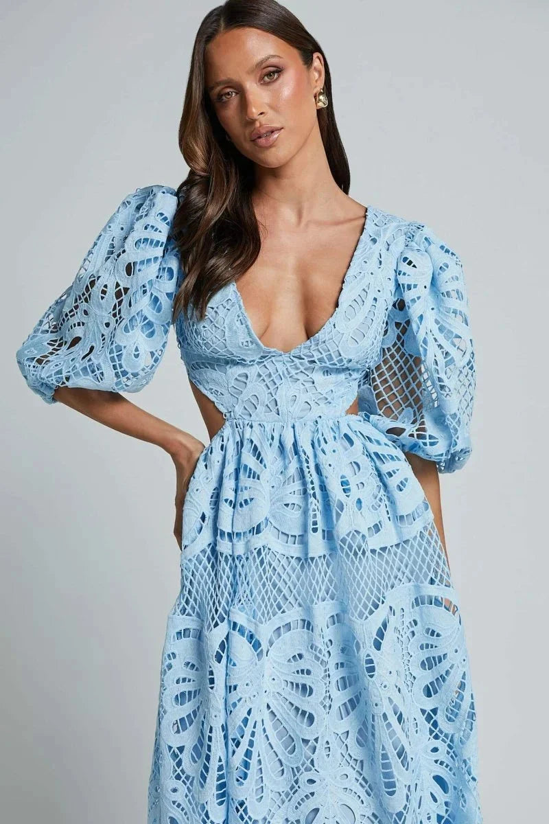Women's lace midi dress with flutter sleeves in a soft and elegant design perfect for special occasions.