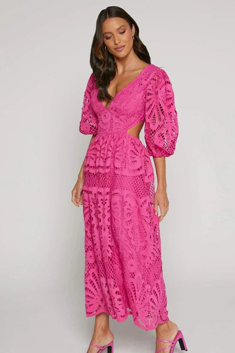 Women's lace midi dress with flutter sleeves in a delicate lace fabric, perfect for a classy and elegant look.