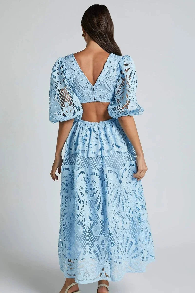 Women's lace midi dress featuring flutter sleeves in a stunning design perfect for special occasions.