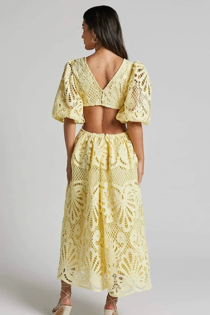 "Diana midi dress with flutter sleeves for women, featuring intricate lace design and elegant silhouette, perfect for…