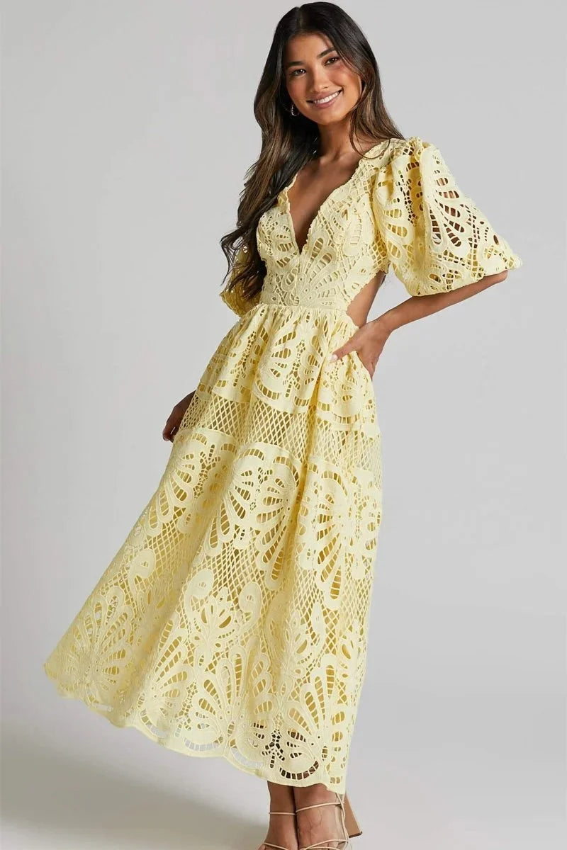Women's lace midi dress with flutter sleeves in navy blue. Delicate lace fabric with elegant flutter sleeves for a chic and…