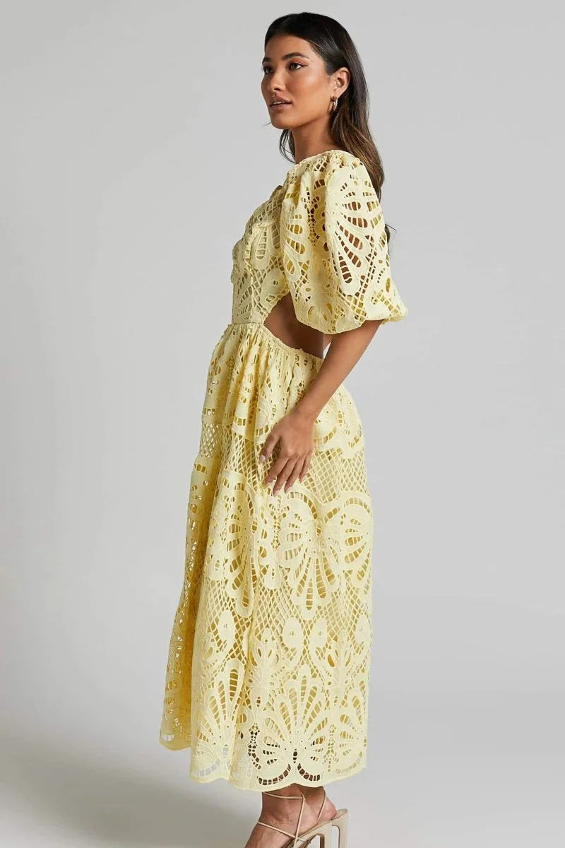 Women’s elegant lace midi dress with delicate flutter sleeves, perfect for special occasions or date nights.