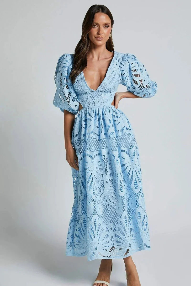 Blue lace midi dress with flutter sleeves for women, elegantly designed with intricate lace details perfect for special…