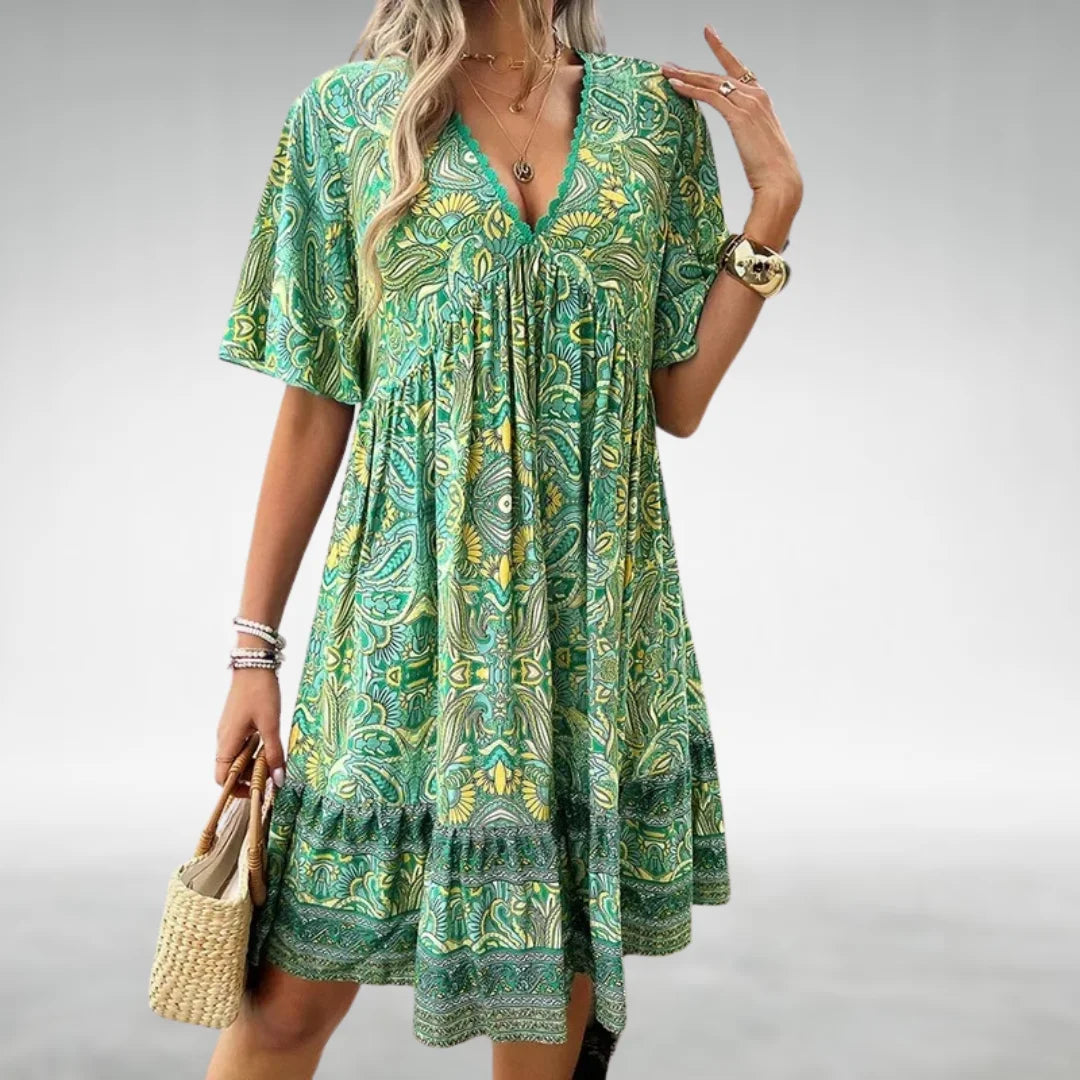 "Bohemian style dress featuring a paisley design in soft, flowing fabric for relaxed, chic look."