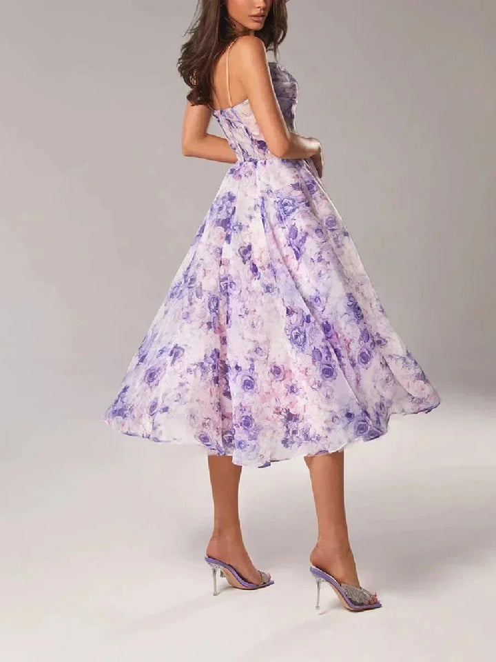 "Egypt strapless floral dress featuring a full skirt, perfect for warm weather, made from lightweight and breathable fabric."