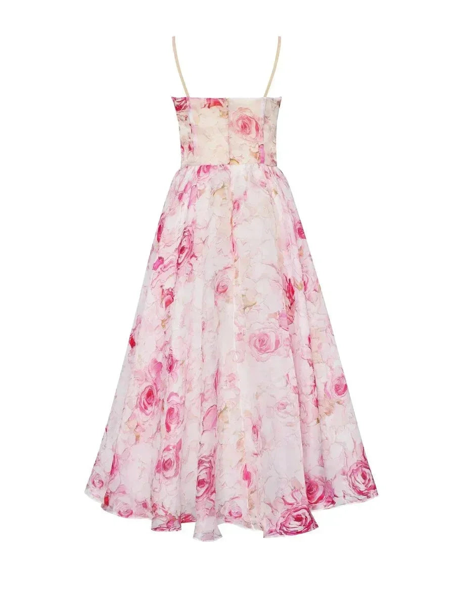 Pink strapless floral dress with a full skirt, perfect for a stylish summer look. Made from breathable and lightweight…
