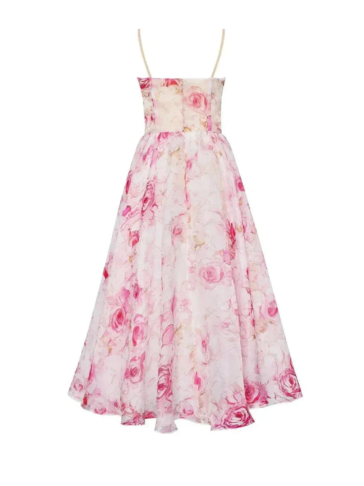 Pink strapless floral dress with a full skirt, perfect for a stylish summer look. Made from breathable and lightweight…