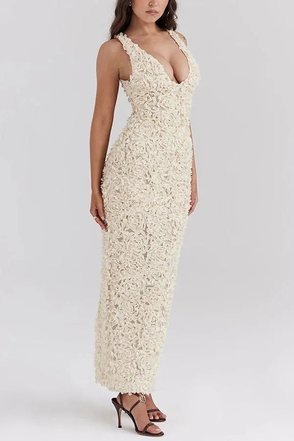 White textured backless maxi dress for women by Elayah. Features a unique design perfect for special occasions.