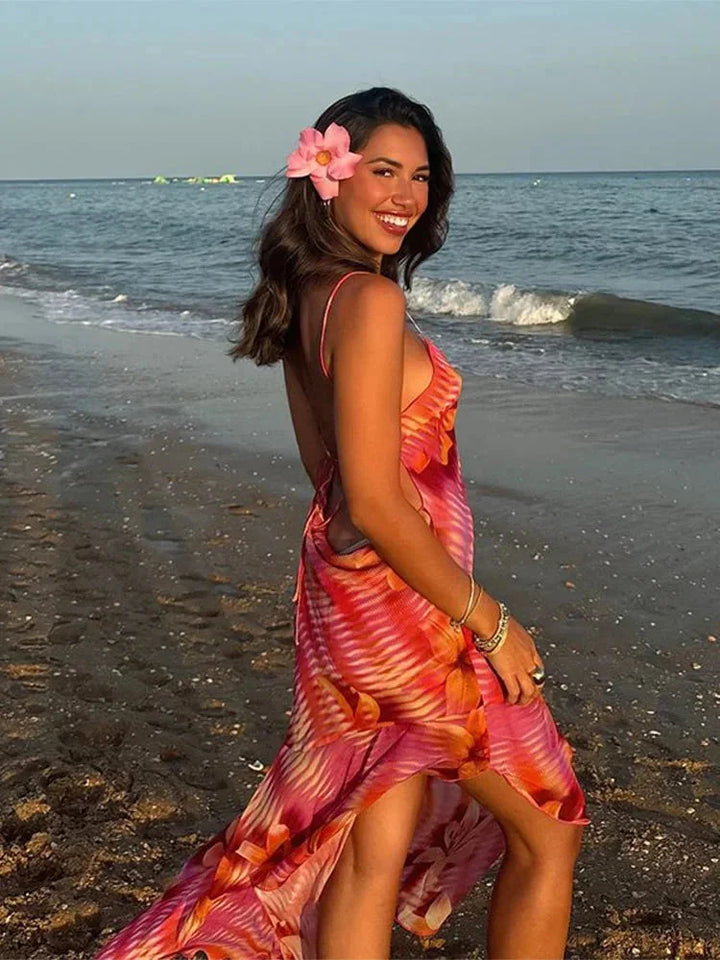 Pink maxi dress with delicate floral accents, perfect for summer. Made from breathable fabric with a flattering silhouette…