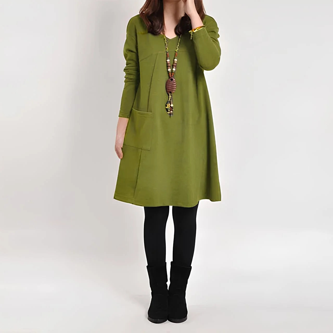 Emeri Shift Dress in Green - A versatile dress with functional pockets, made from comfortable and breathable fabric.