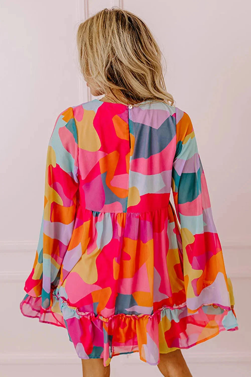 "Estefani women's dress with vibrant bell sleeves, V-neck design in soft, breathable fabric."