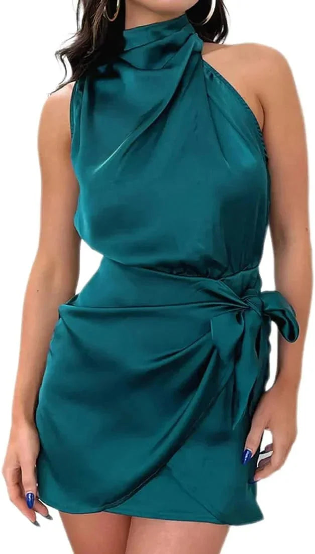 Black halter neck dress with side tie for women. Made from lightweight cotton blend. Features a flattering design for a…