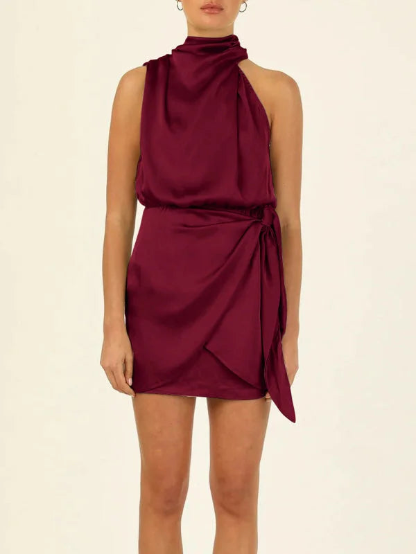 Khaki halter mini dress with draped front, tie waist. Soft cotton blend fabric with a flattering silhouette.